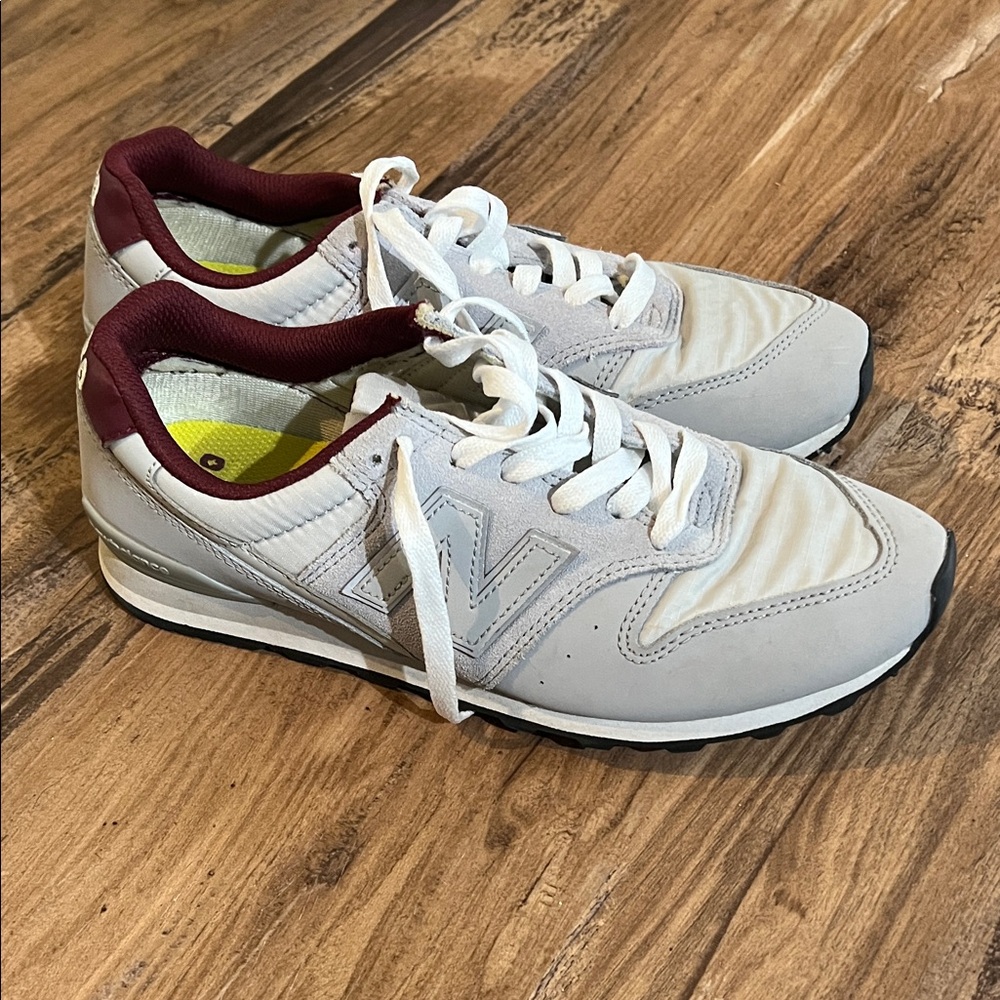 New Balance women’s White and Burgundy Sneakers